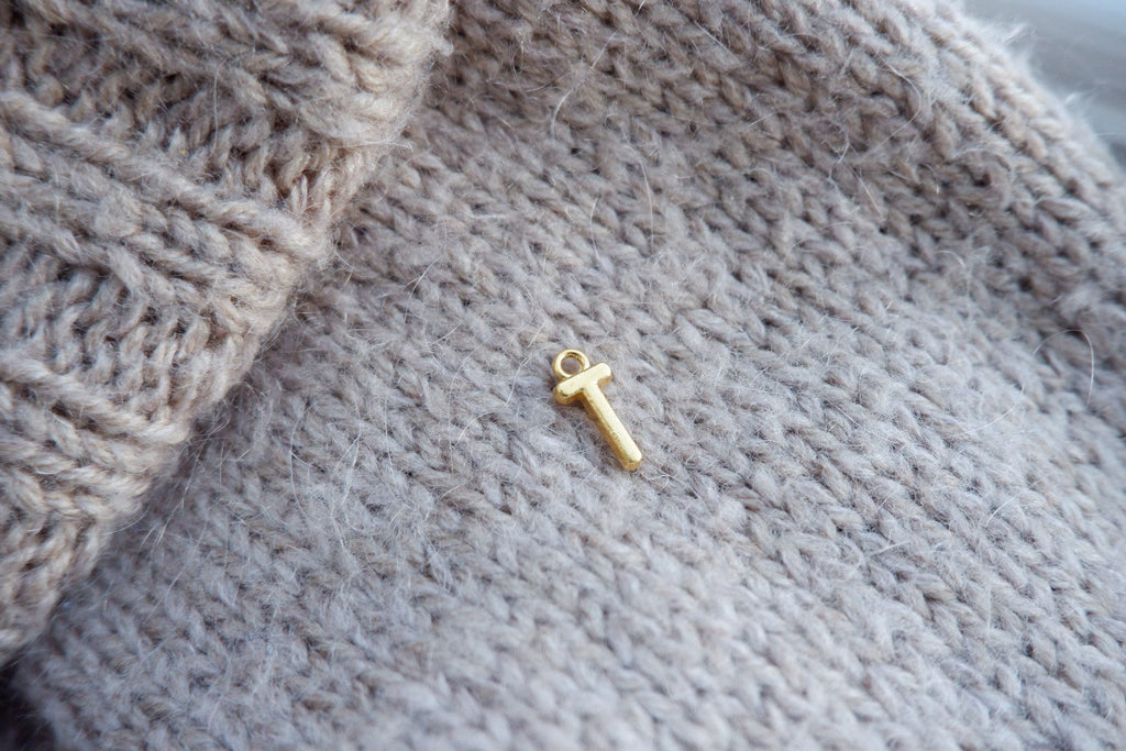 "T"-bogstav-markør (gylden)