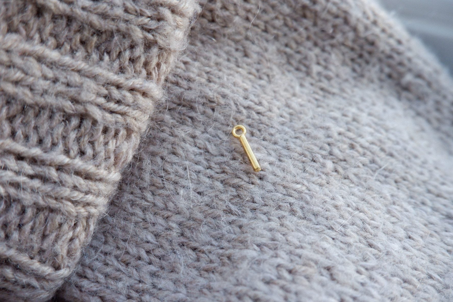 "I"-bogstav-markør (gylden)