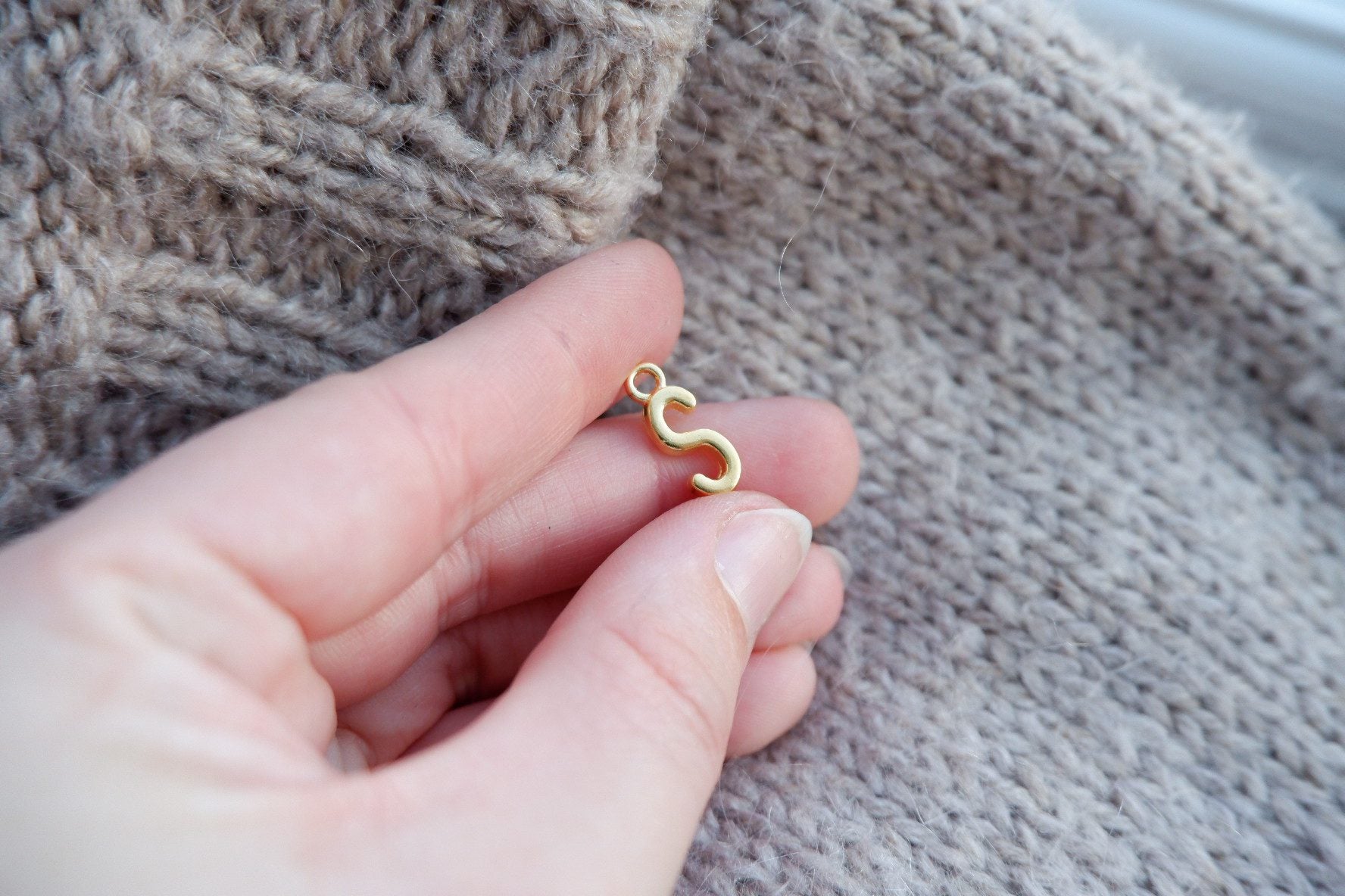 "S"-bogstav-markør (gylden)