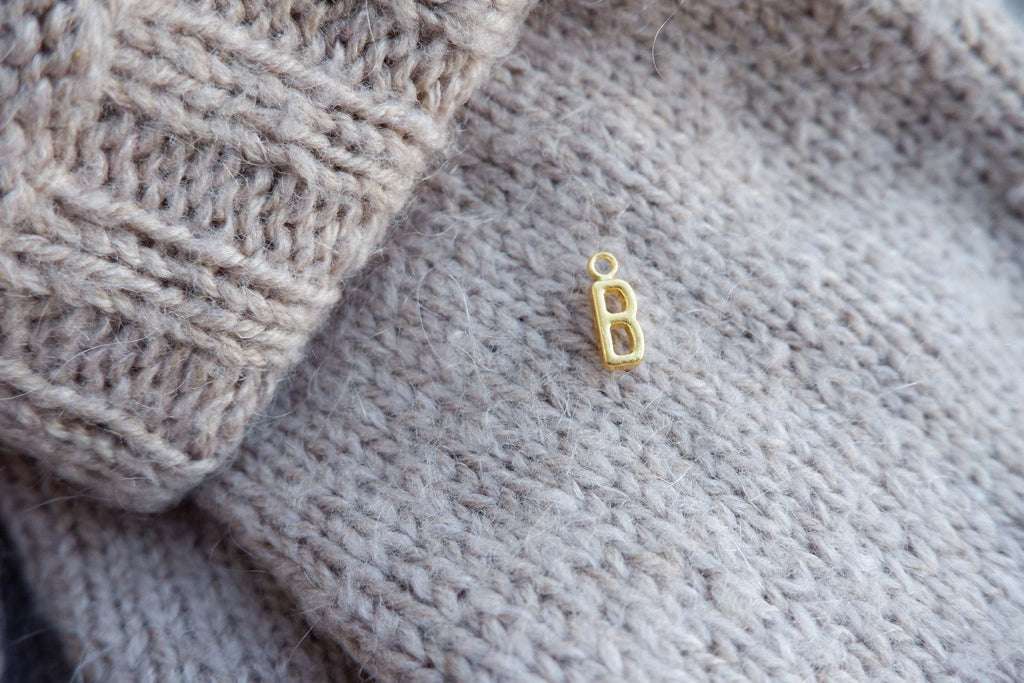 "B"-bogstav-markør (gylden)