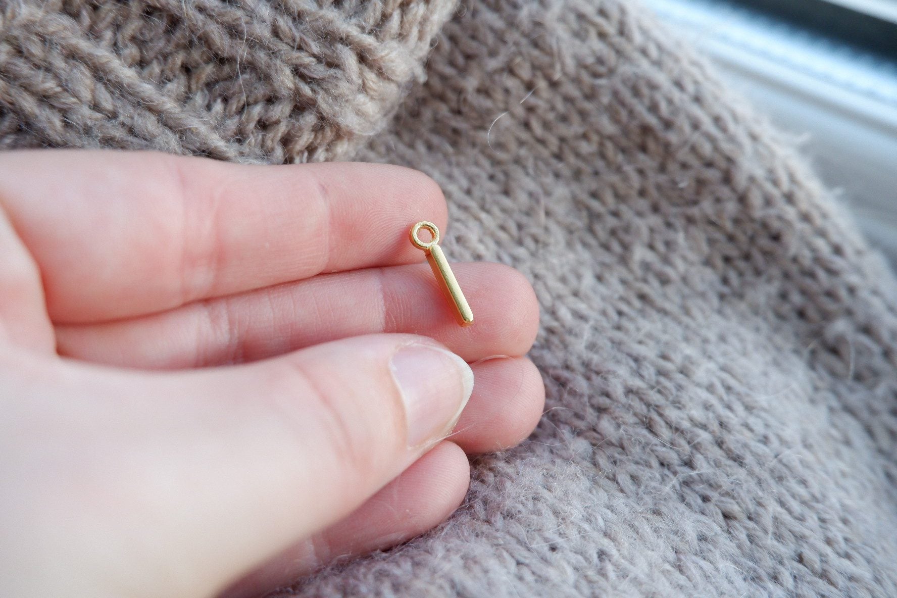 "I"-bogstav-markør (gylden)