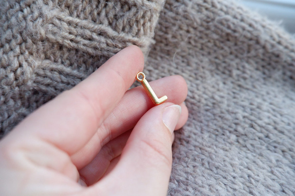 "L"-bogstav-markør (gylden)