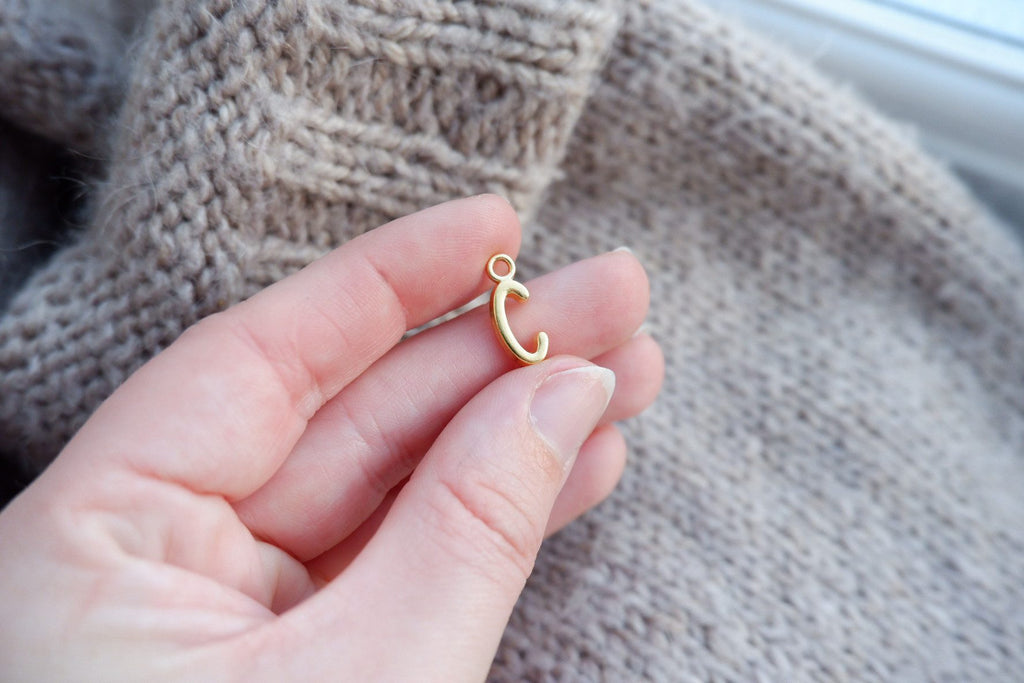 "C"-bogstav-markør (gylden)