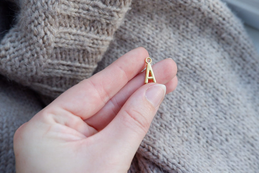 "A"-bogstav-markør (gylden)