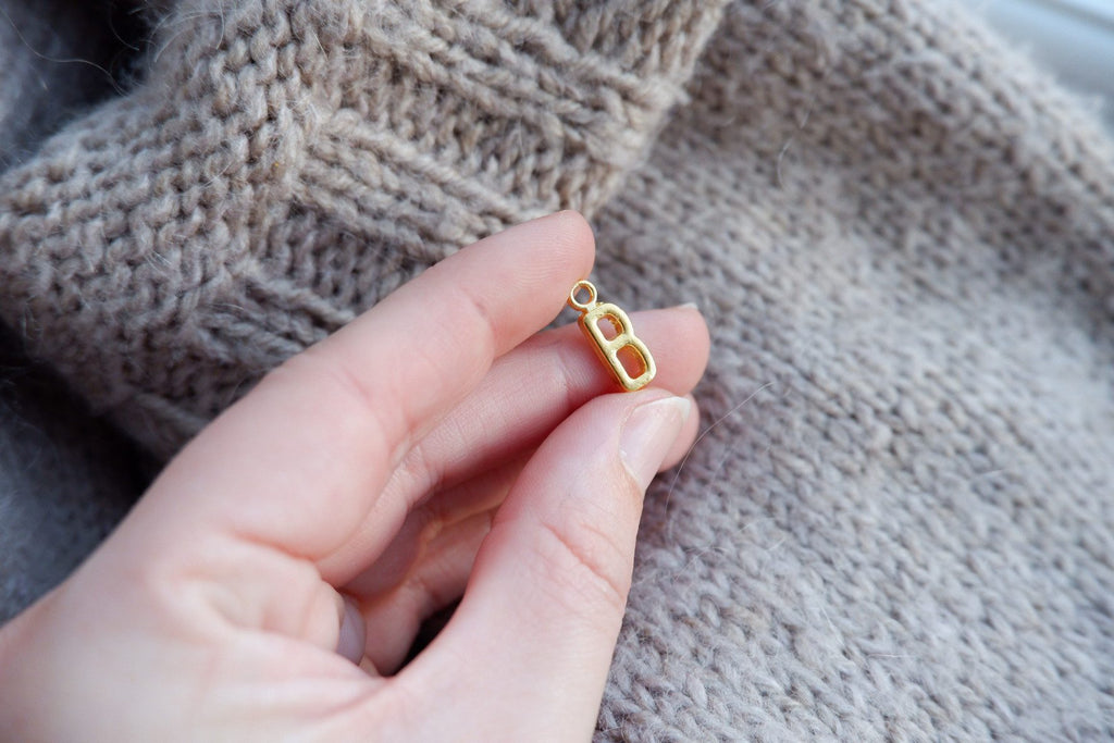 "B"-bogstav-markør (gylden)