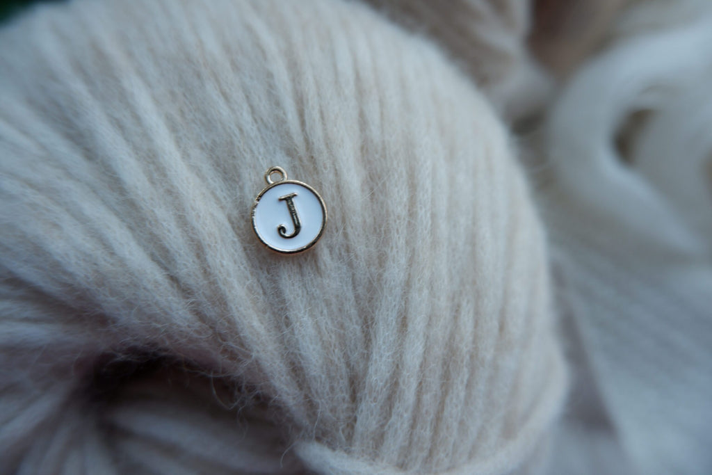 "J"-bogstav-markør (hvid)