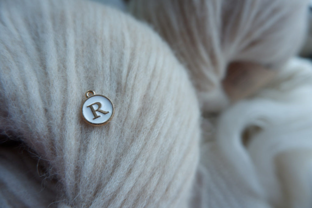 "R"-bogstav-markør (hvid)