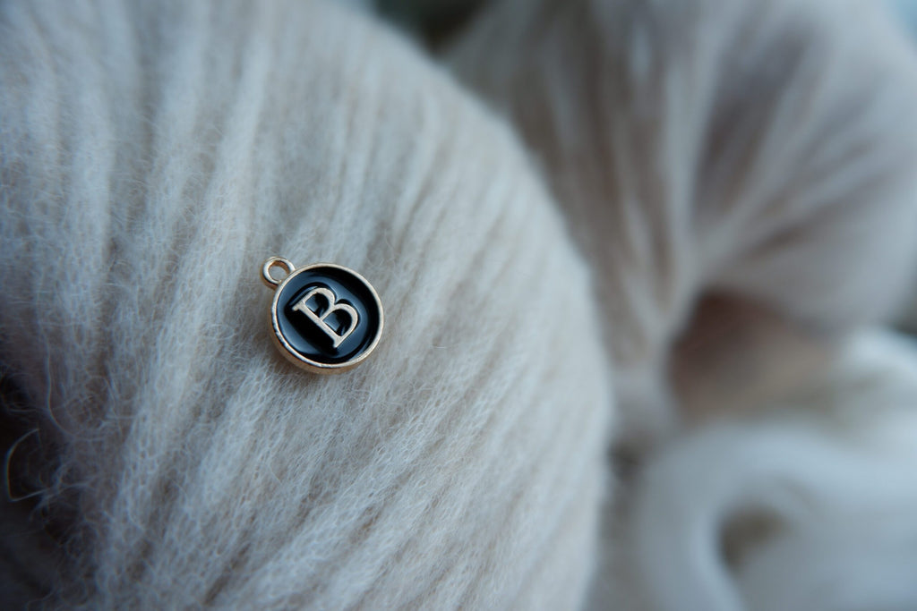 "B"-bogstav-markør (sort)