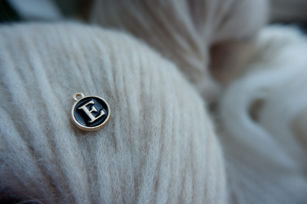 "E"-bogstav-markør (sort)