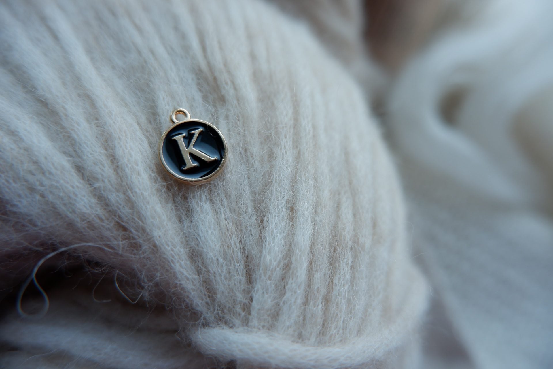 "K"-bogstav-markør (sort)