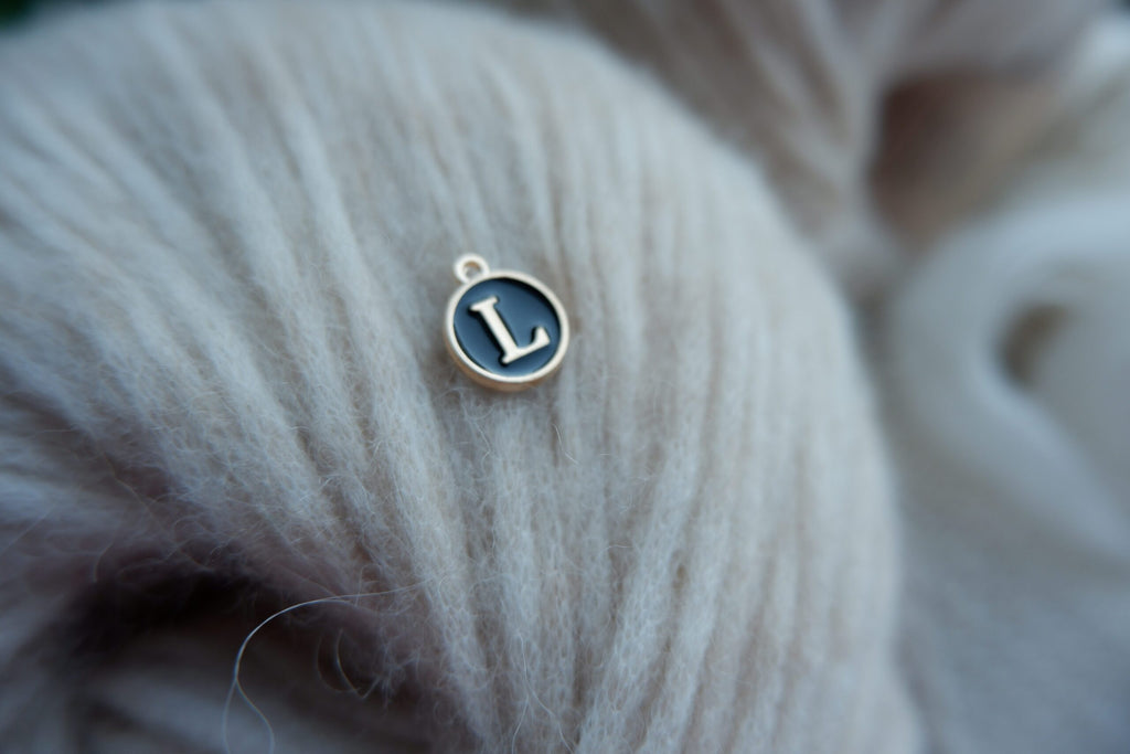 "L"-bogstav-markør (sort)