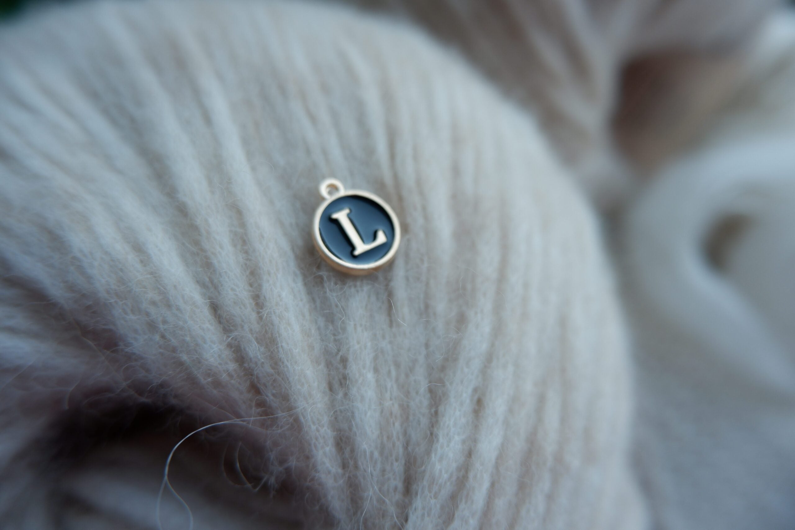 "L"-bogstav-markør (sort)