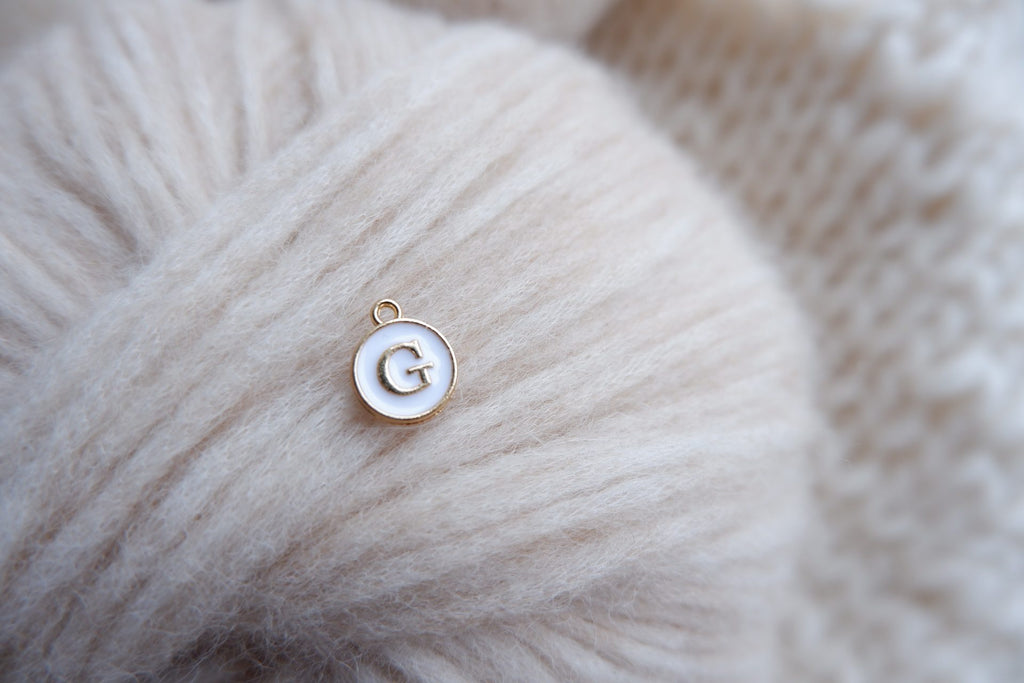 "G"-bogstav-markør (hvid)