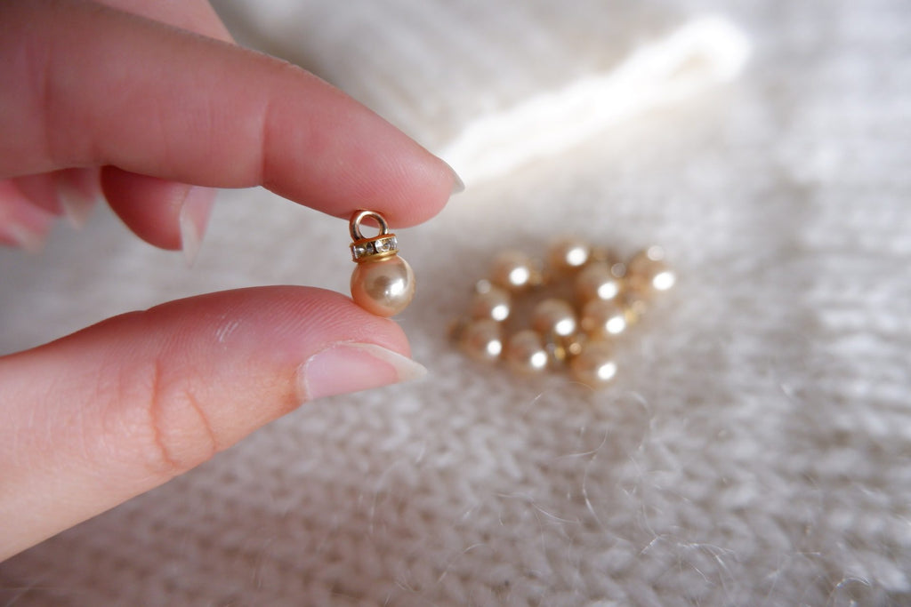 Perle-markør (beige/guld)