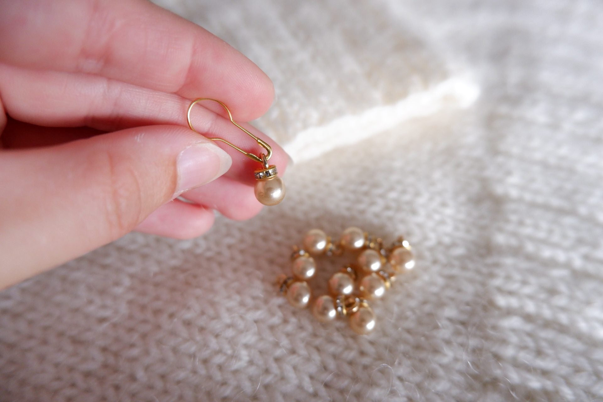 Perle-markør (beige/guld)