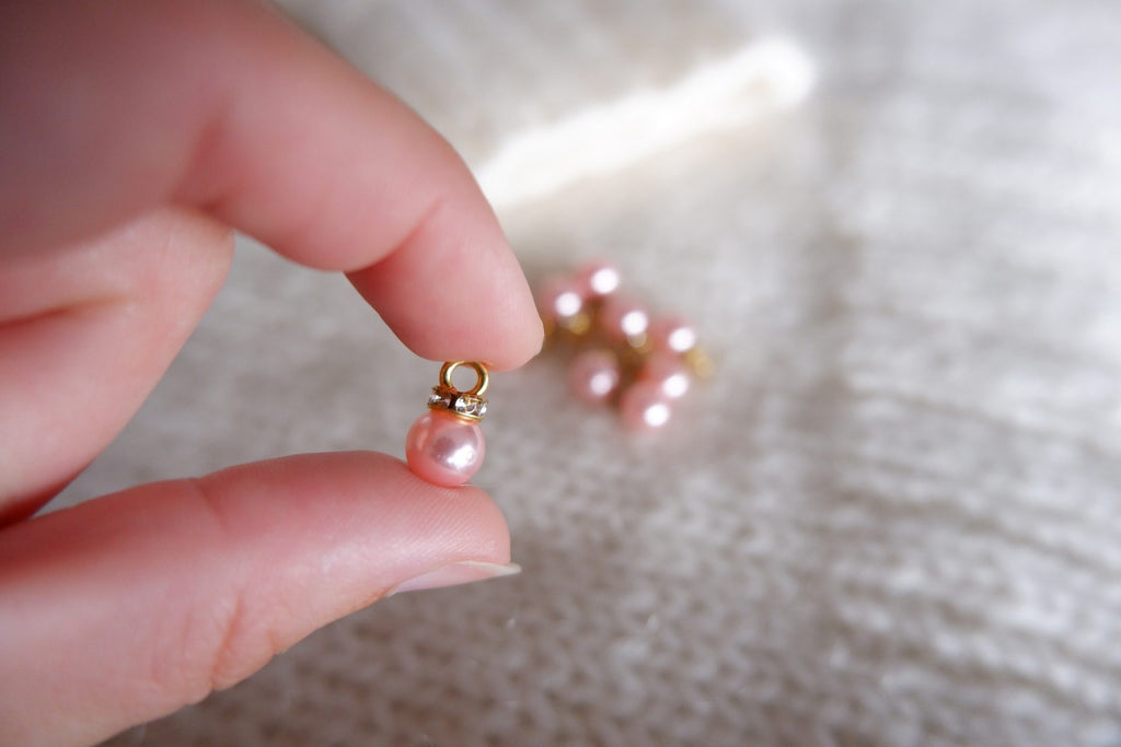 Perle-markør (lyserød/guld)