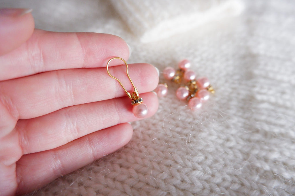Perle-markør (lyserød/guld)