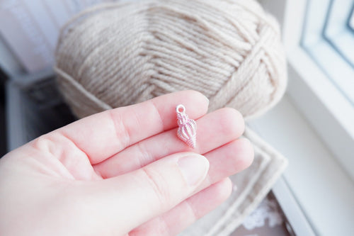 Konkylie-markør (lyserød - metal)