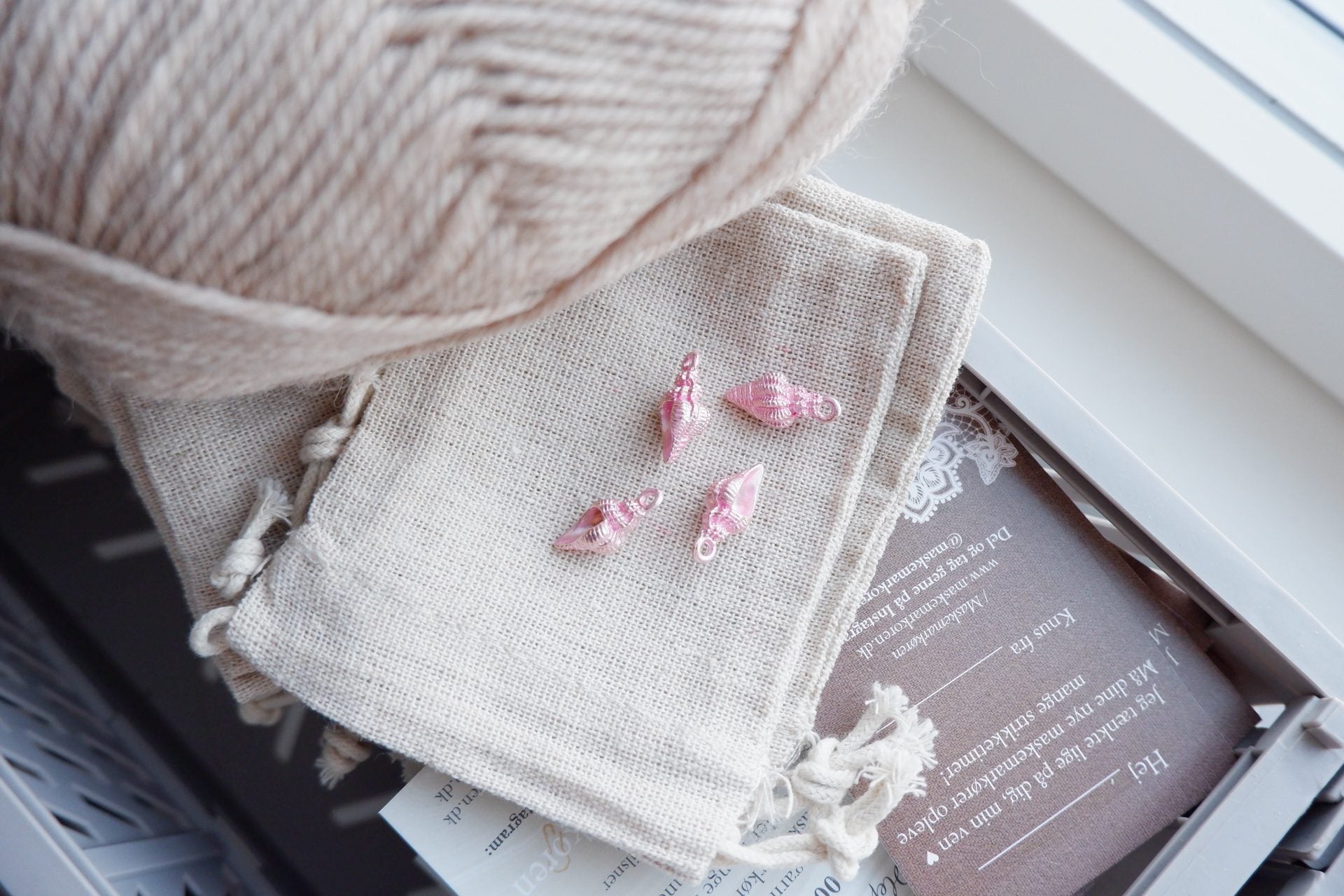 Konkylie-markør (lyserød - metal)