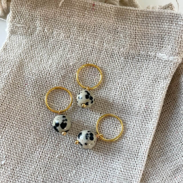 Raglansæt med dalmatiner jaspis-markører og stjernetegns vedhæng