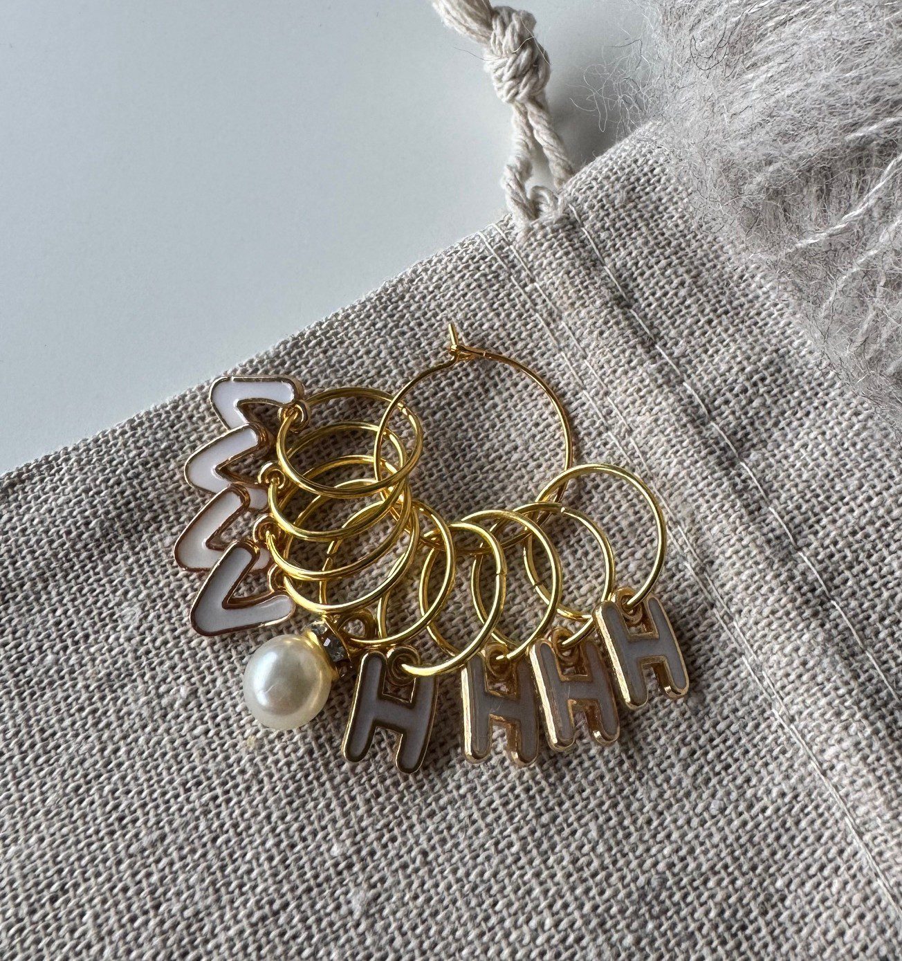 Raglansæt "H" & "V" (moderne lyserød med ring)